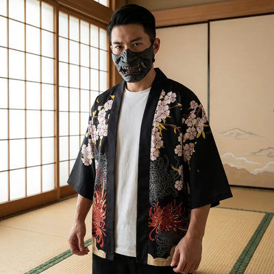Man wearing a kimono jacket haori in a Japanese washitsu room with shoji screens, waist-up front view
