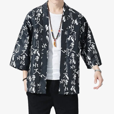Person wearing a black kimono Kanji  with white text japanese patterns on a white background