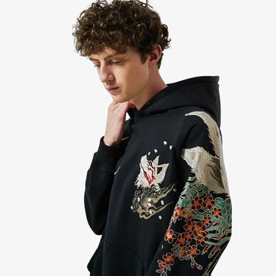 a man dressed with Kitsune hoodie made from high-quality material with a stylish fox design, ideal for a trendy and mythical Japanese loo