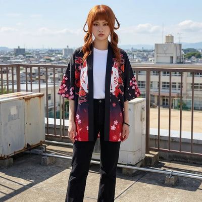 The kitsune sakura kimono wrap worn on a rooftop, sleeves open to show the printed panels.