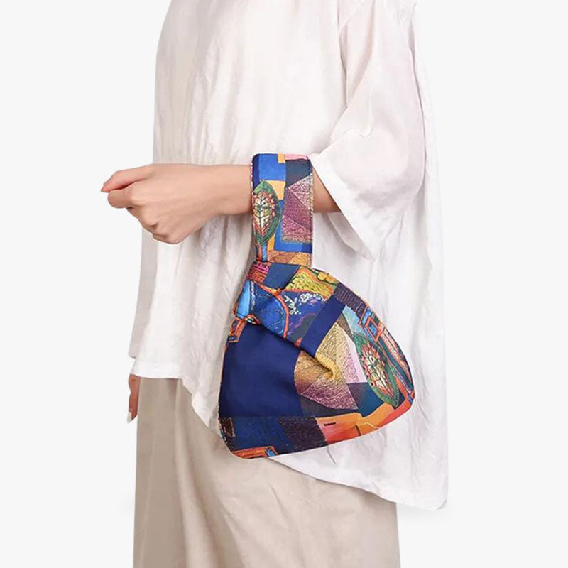 This Japanese knot bag is a tote bag with brightly colored prints on cotton.