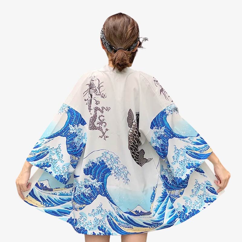 Discover the beauty of the koi fish kimono, featuring intricate designs of koi fish that symbolize perseverance and strength in Japanese culture. A white haori jacket with the great wave of kanagawa printed with Koi fish and Japanese Dragon