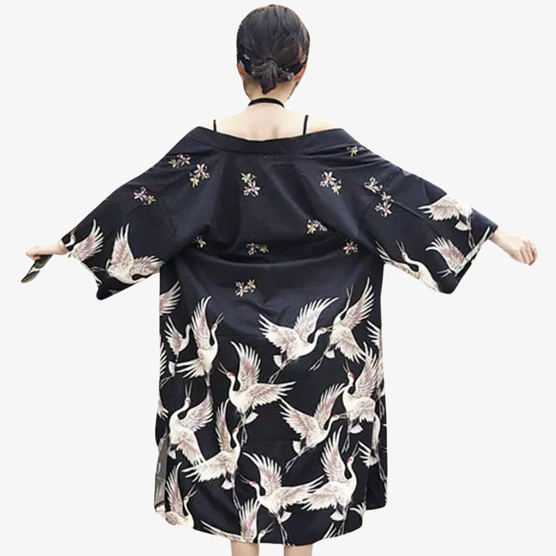 Embrace the bohemian vibe with a long Black duster kimono boho for women, offering a stylish and relaxed fit ideal for layering. Japanese birds printed