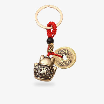 This accessory is a Japanese car maneki neko jewelry charms with a Kanji on the back and a coin with a hole on the same cord.
