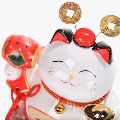 Thismaneki neko lucky cat for saleis a traditional japanese figurine you can use as a piggy bank made in ceramic.