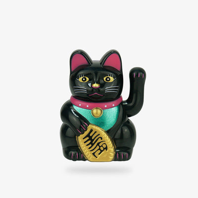 This lucky cat is a black maneki neko solar. The Japanese lucky cat is made of PU. The statuette holds a gold Koban coin in its right paw. The left paw is raised and moving thanks to solar energy.