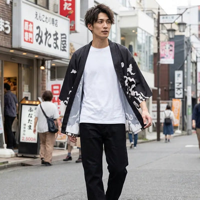 Man wearing a manga kimono in a Harajuku street in Tokyo, front view