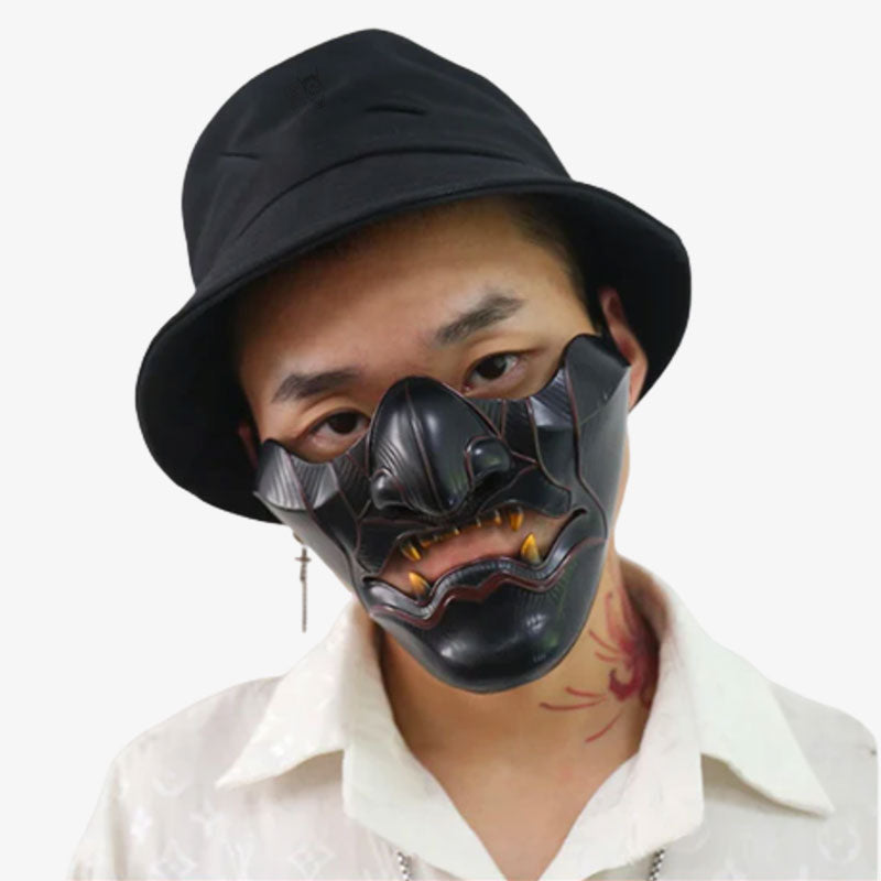 A Japanese man wears mask ghost of tshushima with a black bob and white shirt. Japanese oni samurai mask is resin