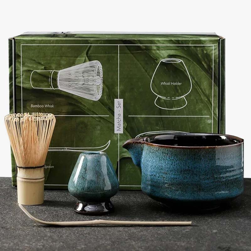 Matcha tea set including chasen whisk, chawan bowl, chashaku spatula, and ceramic whisk holder