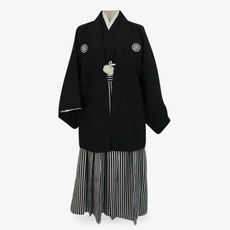 Men black Japanese kimono set including a haori jacket and striped hakama pants, crafted from Habutae and Sendaihira fabrics with family crest details.