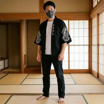 Man wearing a dragon haori in a traditional Japanese washitsu room, front view