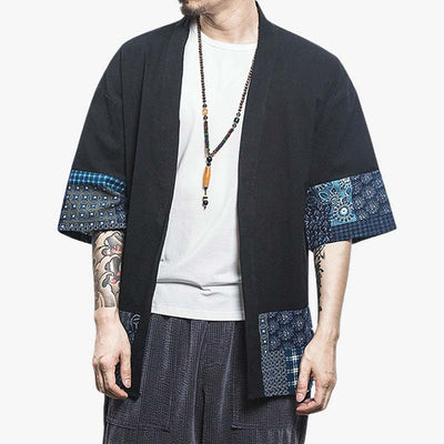 This traditional Japanese garment is a men kimono cardigan. This kimono jacket is black with Japanese geometric motifs printed on the three-quarter length sleeves.