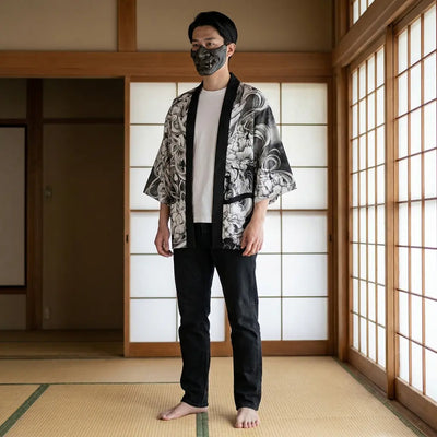 Man wearing a kimono haori in a traditional Japanese washitsu room, front view