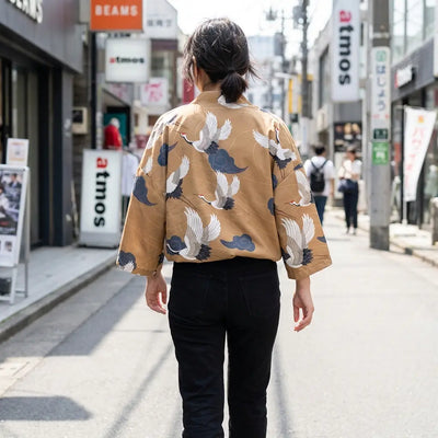 Woman seen from behind wearing a haori yukata in a Harajuku street