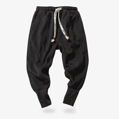 These black Japanese pants are perfect for a streetwear, casual and zen wardrobe. Nikka zubon pants can be tied with drawstrings in a Kanji-style print