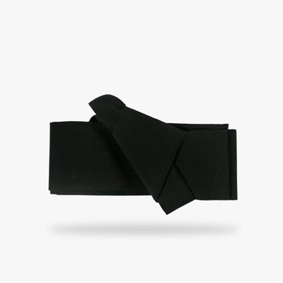 The obi black belt is used to fasten a Japanese kimono or a men's Yukata.