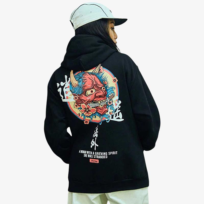 A girl is dressed with an oni black hoodie. Material is cotton, and the japanese demon design is red