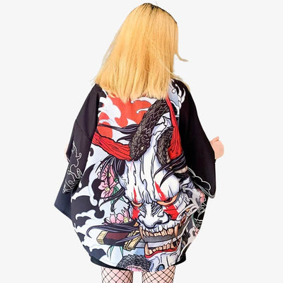 A girl is wearing a Black Oni Kimono, featuring striking designs inspired by the legendary Japanese demon, perfect for a bold and unique fashion statement