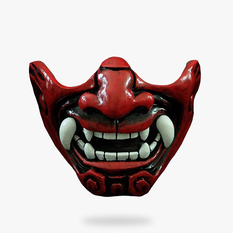 This Oni mask red is half the face of a Japanese demon. This red Japanese mask has fangs and white teeth.