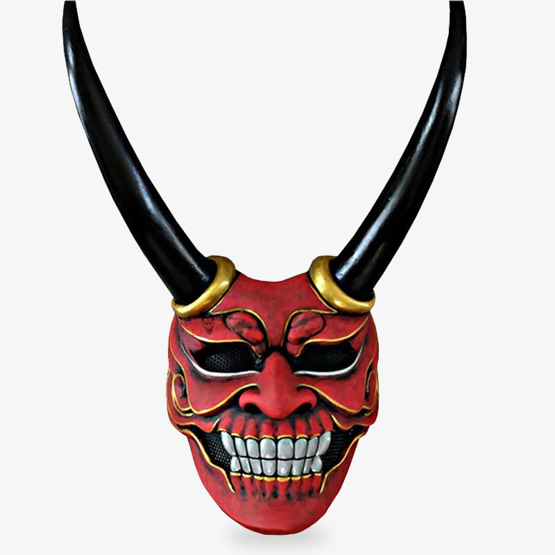 This Oni red demon mask Japanese is inspired by the Oni mask. It's an ogre and monstra from Japanese folklore. The handmade mask is painted red with dourure on the extremities. The Japanese mask has large black horns.