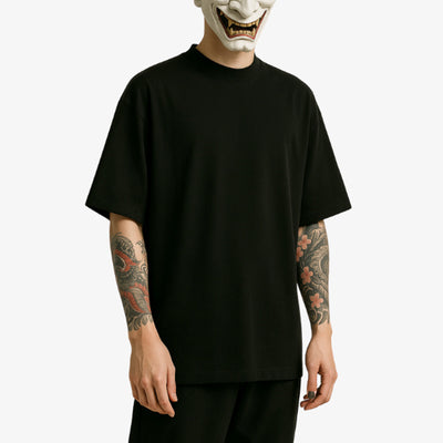 A black Oversize Harajuku shirt with minimalist design, reflecting the playful and experimental side of Japanese street style