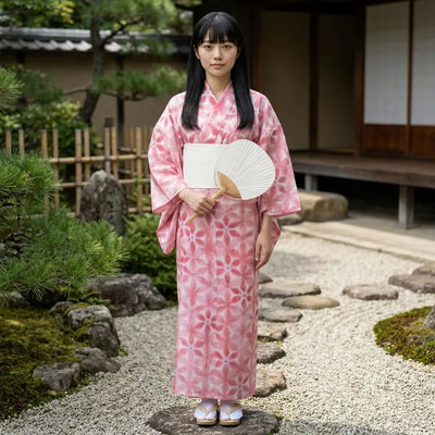 Close-up of the asanoha hemp leaf print on the pink women's yukata