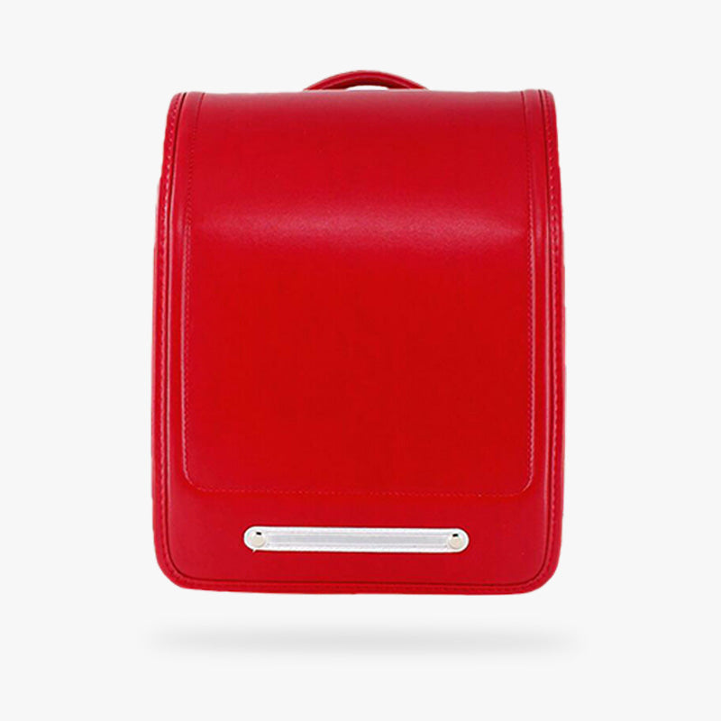 This red randoseru bag is a Japanese school satchel. It is a Japanese bag made of resistant leather, practical and vintage.