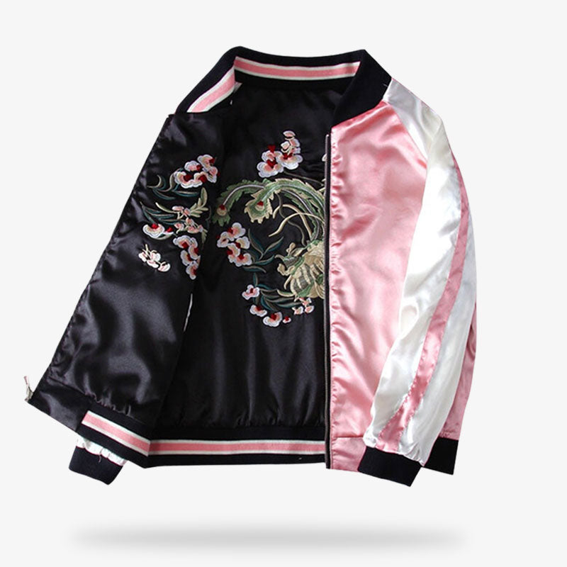 This sukajan jacket is  reversible souvenir bomber jacket for women. The Japanese jacket is black and white with flower embroidery.