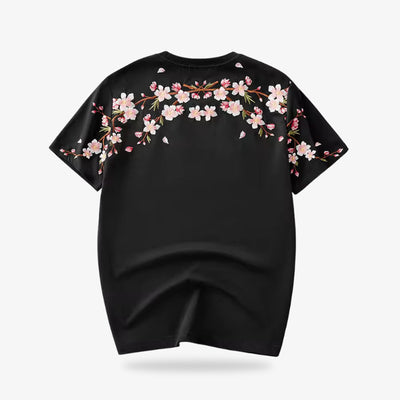 Black t-shirt with cherry blossom floral design on a white background