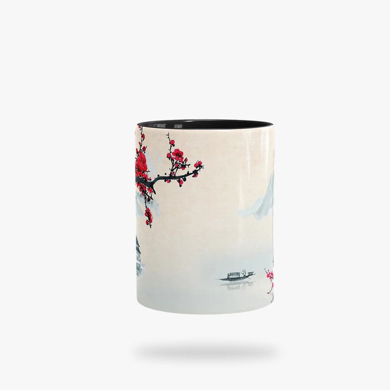 The sakura mug is adorned with a detailed cherry blossom pattern and traditional Japanese village scenery, capturing the beauty and tranquility of Japan's iconic springtime