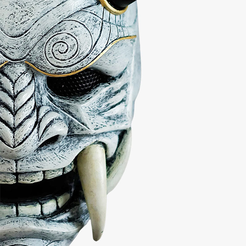 The White samurai Japanese Oni mask is a handcrafted piece, featuring detailed hand-painted and sculpted designs with horns and sharp teeth that bring the legendary Oni demon to life