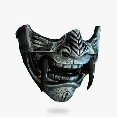 This silver demon mask has terrifying black teeth