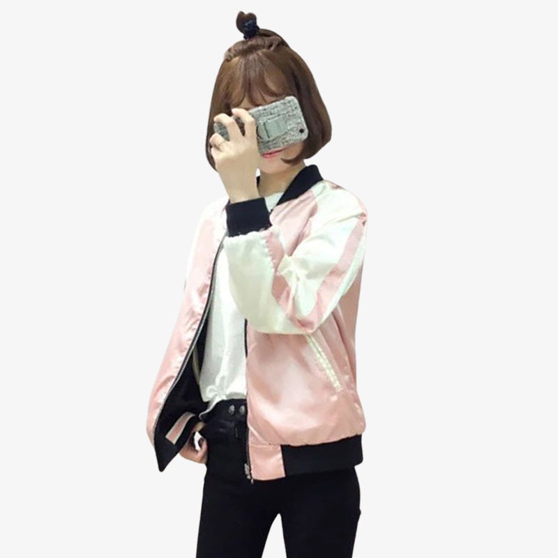 This Japanese woman is dressed in a harajuku-style sukajan jacket womens. It's a Japanese bomber jacket with white color and quality satin material.