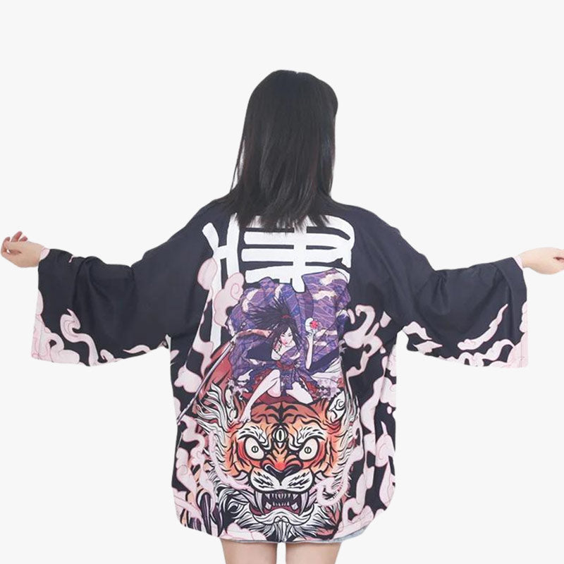 The tiger kimono features bold and powerful tiger designs, perfect for making a striking fashion statement that blends traditional Japanese artistry with modern style. The women is standing with her black kimono jacket