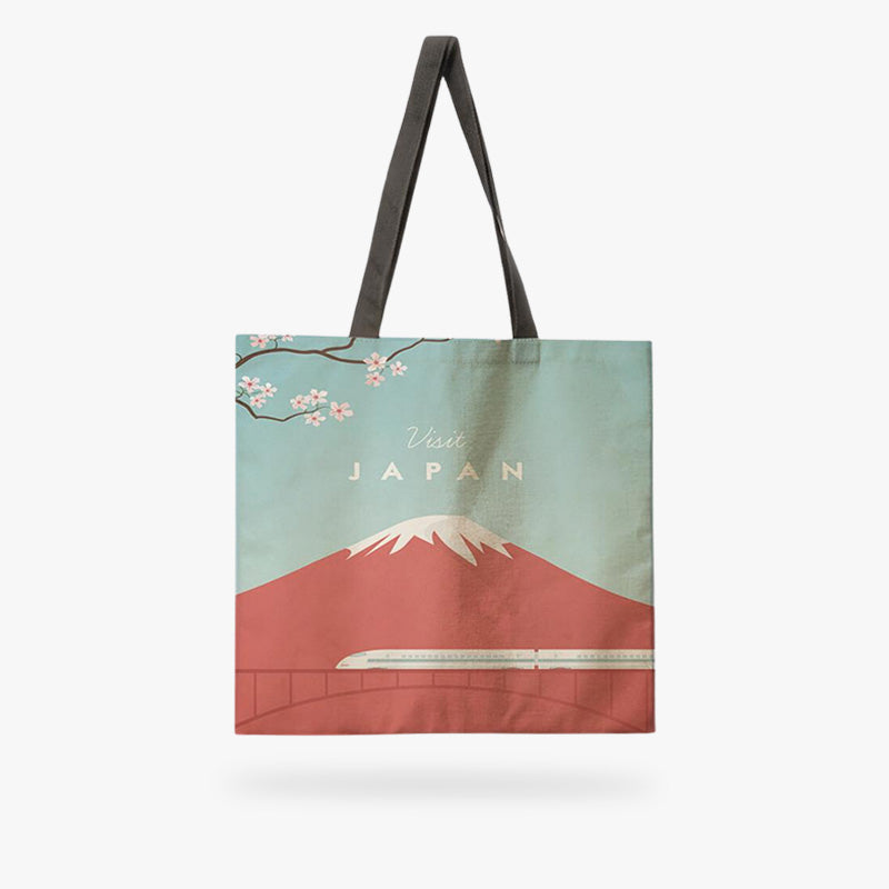 Admire the beauty of Japan with our Tote Bag With Mount Fuji, showcasing the iconic mountain in a stunning print that blends tradition with modern fashion.