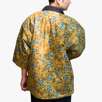 A person wearing a traditional hanten tokyo with japanese dragon symbols