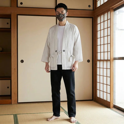 Man wearing a white haori jacket in a traditional Japanese washitsu room, front view