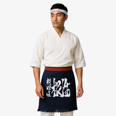 Traditional Japanese apron made from high-quality thick cotton in navy, featuring a white kanji print that symbolizes authenticity and cultural heritage in culinary arts.