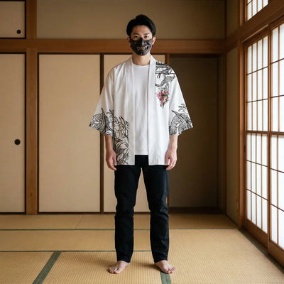 Man wearing a kimono oni in a traditional Japanese washitsu room, front view