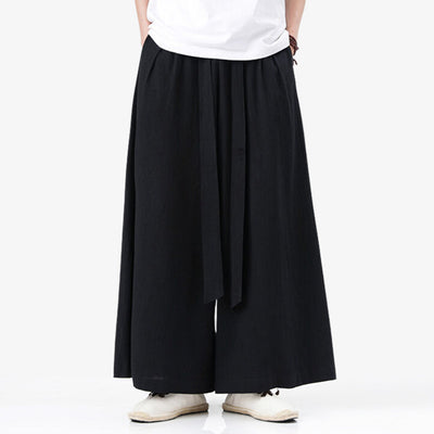 These traditional Japanese pants are black hakama. Fluid, zen-like pants