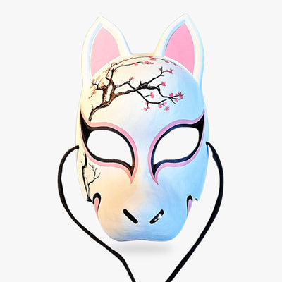 The traditional kitsune mask is japanese fox mask with white color and a sakura tree design