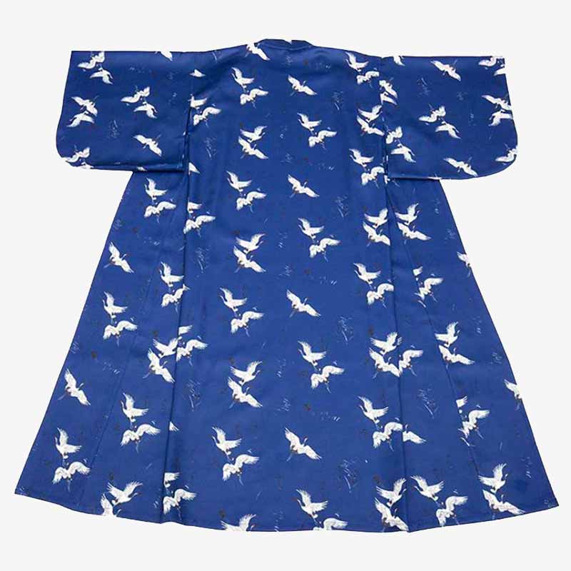 a traditional purple kimono with whit japanese birds pattern