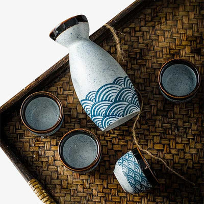 Vintage glass sake set, bringing a touch of retro Japanese design to your sake collection. Japanese sake set made with ceramic material and Japanese wave pattern seigaiha.