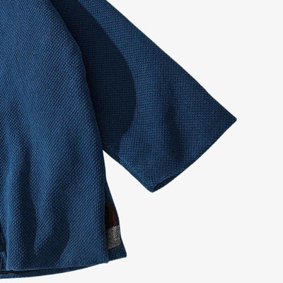 Vintage Japanese kimono jacket crafted with minimalist indigo tones, reflecting timeless Japanese artistry