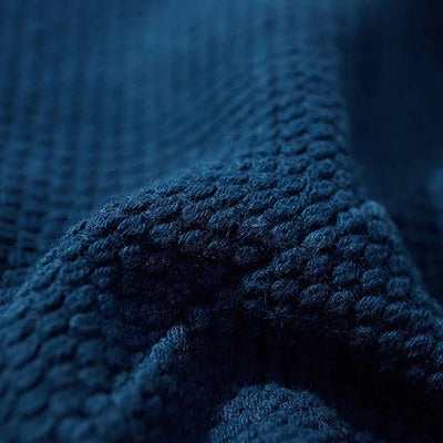 The Vintage kimono jacket material featuring a minimalist indigo blue design, reflecting traditional Japanese aesthetics and timeless elegance