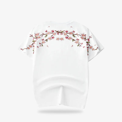 a White embroidered shirt with floral design on a white background