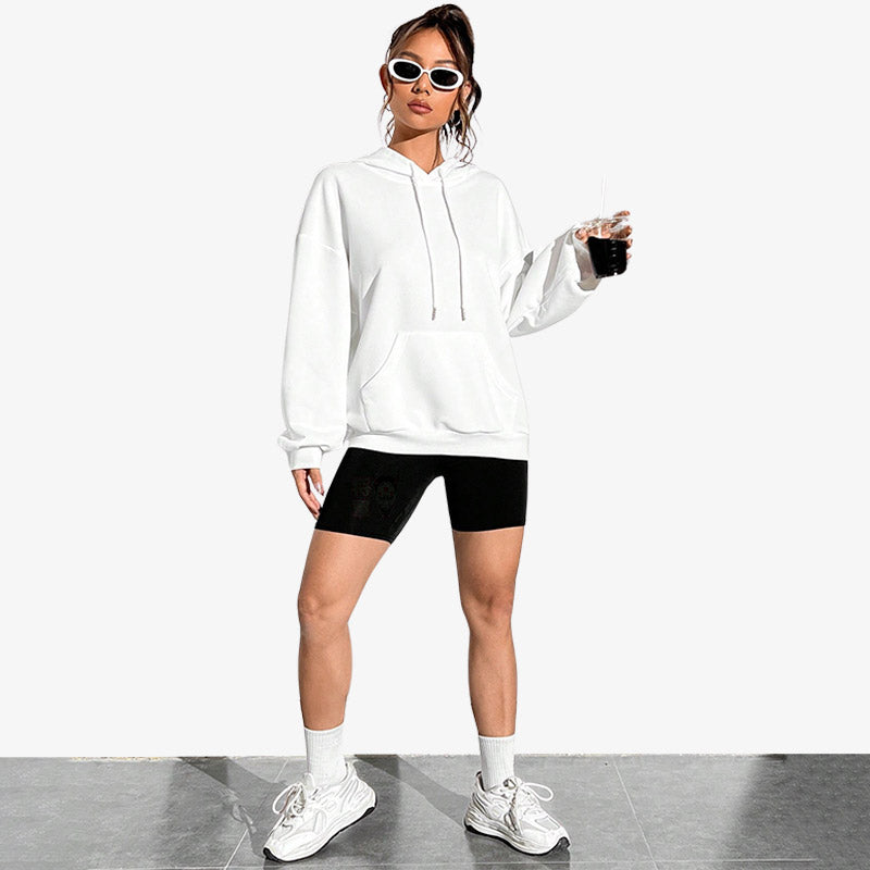 A standing girl is dressed with a white japanese sweatshirt hoodie