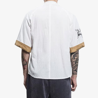 A man with irezumi tattoo, is dressed with white japanese tee-shirt made with cotton