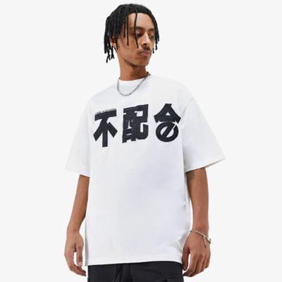 a black men is dressed with a White kanji t-shirt with subtle Japanese calligraphy, designed for a clean, cultural, and modern aesthetic.