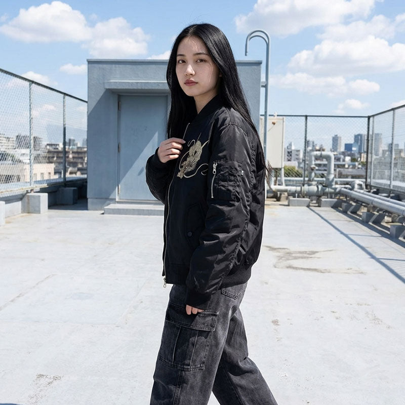 woman wearing a black japanese dragon sukajan jacket with a Tokyo  cityscape in the background